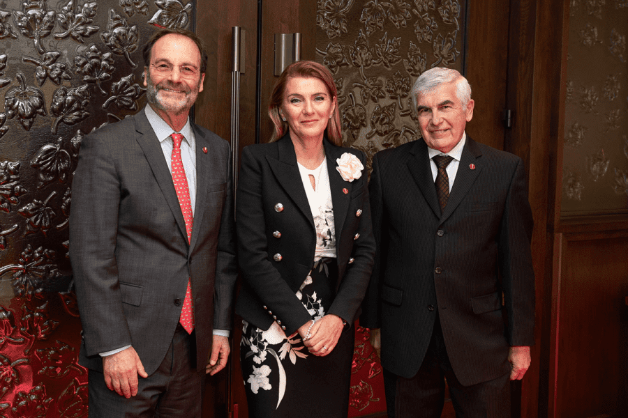 Senator Manuelle Oudar (centre,)stands outside the Red Chamber on February 27, 2024. Also pictured are senators Marc Gold (left) and Clément Gignac (right). Photo Credit: Senate Communications