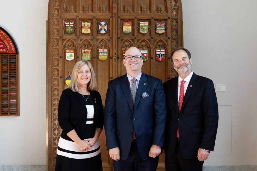 Senator Wells (centre) has worked to advance equality and diversity in Alberta and across the country, including as a champion of the 2SLGBTQI+ community.